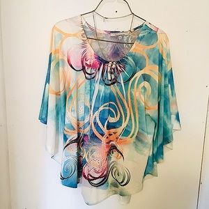 Colourful flowy top